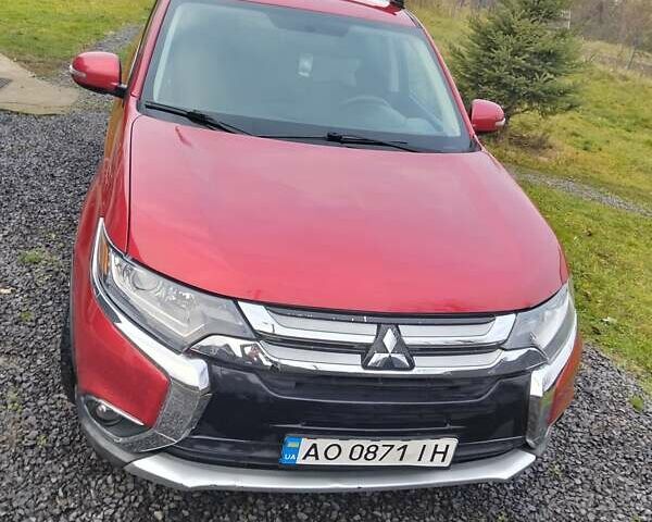 Красный Мицубиси Аутлендер, объемом двигателя 2.36 л и пробегом 110 тыс. км за 16800 $, фото 4 на Automoto.ua