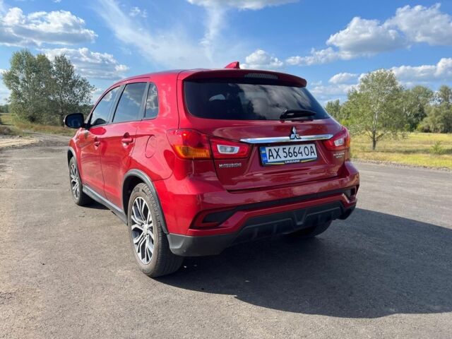 Красный Мицубиси Аутлендер, объемом двигателя 2 л и пробегом 130 тыс. км за 14300 $, фото 3 на Automoto.ua