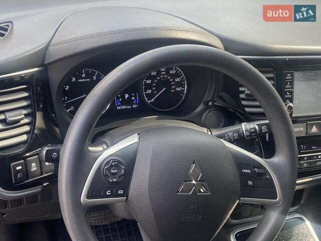 Красный Мицубиси Аутлендер, объемом двигателя 2.4 л и пробегом 75 тыс. км за 16550 $, фото 18 на Automoto.ua