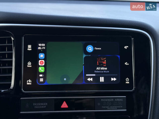 Красный Мицубиси Аутлендер, объемом двигателя 2 л и пробегом 85 тыс. км за 18900 $, фото 80 на Automoto.ua