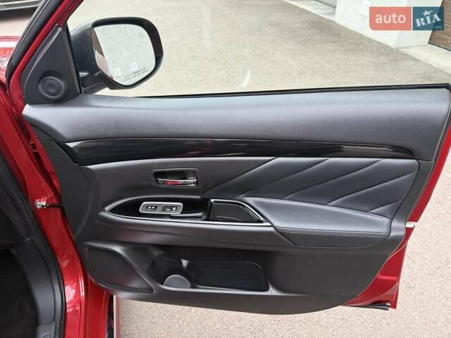 Красный Мицубиси Аутлендер, объемом двигателя 2 л и пробегом 176 тыс. км за 18900 $, фото 16 на Automoto.ua