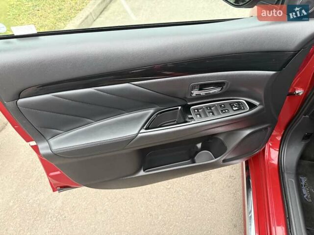 Красный Мицубиси Аутлендер, объемом двигателя 2 л и пробегом 176 тыс. км за 18900 $, фото 17 на Automoto.ua