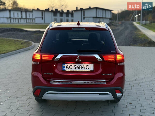 Красный Мицубиси Аутлендер, объемом двигателя 2 л и пробегом 85 тыс. км за 18900 $, фото 67 на Automoto.ua