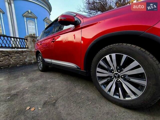 Красный Мицубиси Аутлендер, объемом двигателя 2.4 л и пробегом 125 тыс. км за 17400 $, фото 10 на Automoto.ua