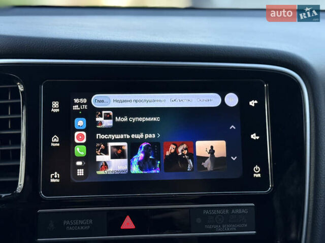 Красный Мицубиси Аутлендер, объемом двигателя 2 л и пробегом 85 тыс. км за 18900 $, фото 84 на Automoto.ua