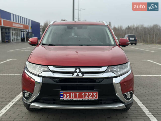 Красный Мицубиси Аутлендер, объемом двигателя 2.2 л и пробегом 118 тыс. км за 20999 $, фото 1 на Automoto.ua
