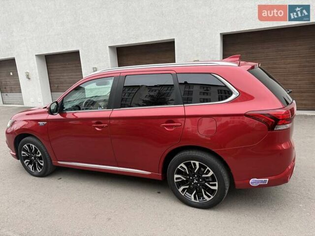 Красный Мицубиси Аутлендер, объемом двигателя 2 л и пробегом 176 тыс. км за 18900 $, фото 7 на Automoto.ua