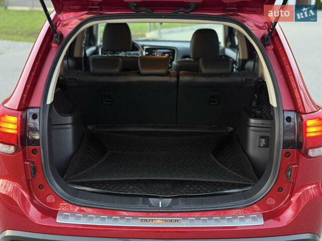 Красный Мицубиси Аутлендер, объемом двигателя 2 л и пробегом 85 тыс. км за 18900 $, фото 56 на Automoto.ua
