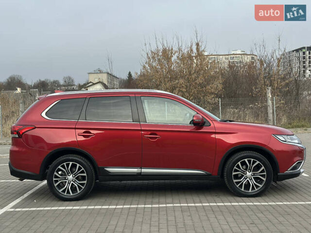 Красный Мицубиси Аутлендер, объемом двигателя 2.2 л и пробегом 118 тыс. км за 20999 $, фото 3 на Automoto.ua