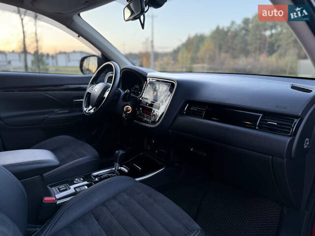 Красный Мицубиси Аутлендер, объемом двигателя 2 л и пробегом 85 тыс. км за 18900 $, фото 36 на Automoto.ua