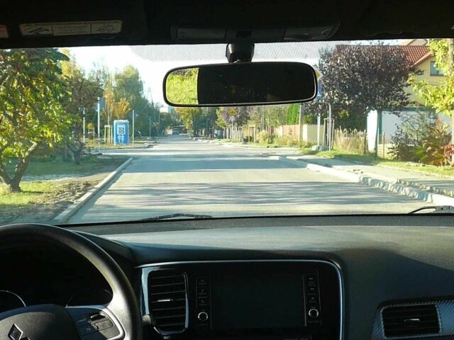 Красный Мицубиси Аутлендер, объемом двигателя 2.4 л и пробегом 117 тыс. км за 10500 $, фото 9 на Automoto.ua