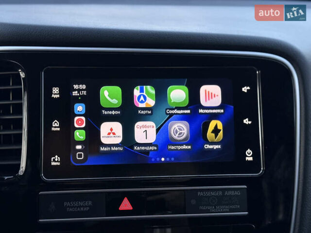 Красный Мицубиси Аутлендер, объемом двигателя 2 л и пробегом 85 тыс. км за 18900 $, фото 81 на Automoto.ua