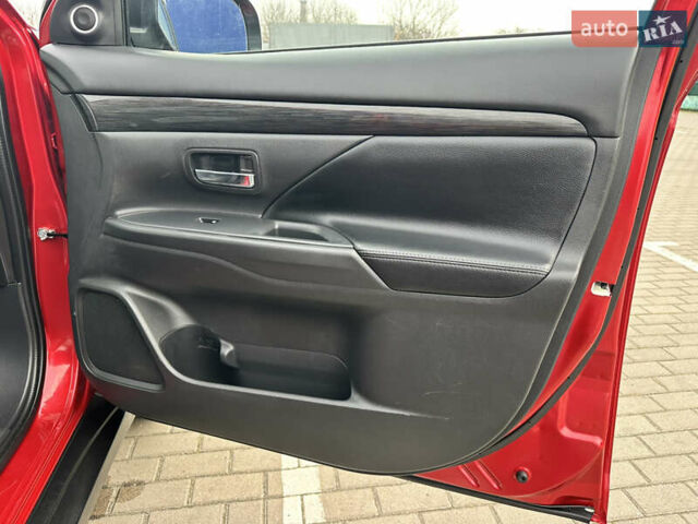 Красный Мицубиси Аутлендер, объемом двигателя 2.2 л и пробегом 118 тыс. км за 20999 $, фото 57 на Automoto.ua