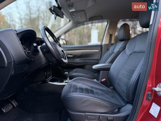 Красный Мицубиси Аутлендер, объемом двигателя 2 л и пробегом 85 тыс. км за 18900 $, фото 28 на Automoto.ua