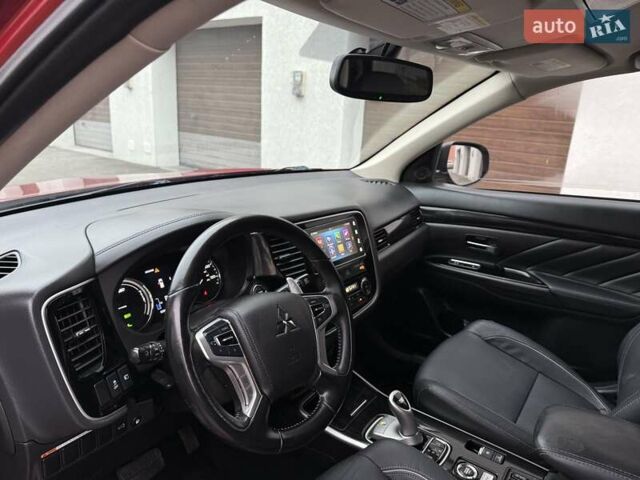 Красный Мицубиси Аутлендер, объемом двигателя 2 л и пробегом 176 тыс. км за 18900 $, фото 12 на Automoto.ua