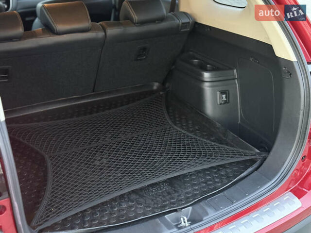 Красный Мицубиси Аутлендер, объемом двигателя 2 л и пробегом 85 тыс. км за 18900 $, фото 57 на Automoto.ua