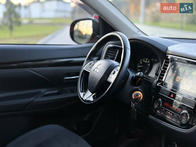 Красный Мицубиси Аутлендер, объемом двигателя 2 л и пробегом 85 тыс. км за 18900 $, фото 24 на Automoto.ua