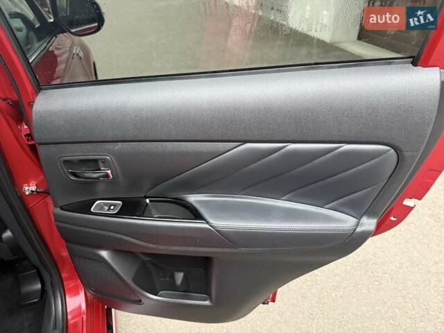 Красный Мицубиси Аутлендер, объемом двигателя 2 л и пробегом 176 тыс. км за 18900 $, фото 21 на Automoto.ua