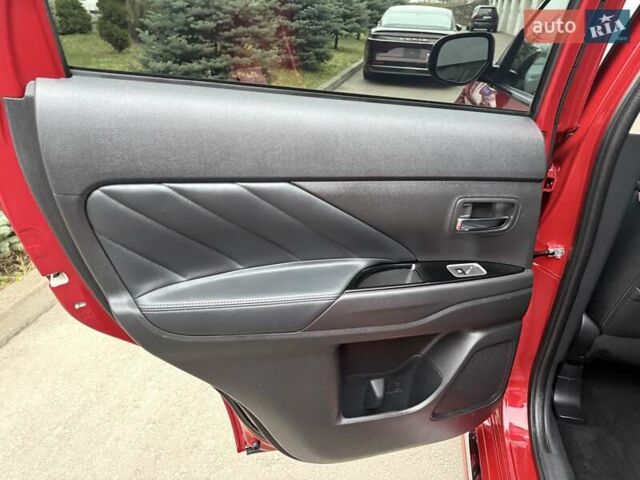 Красный Мицубиси Аутлендер, объемом двигателя 2 л и пробегом 176 тыс. км за 18900 $, фото 20 на Automoto.ua