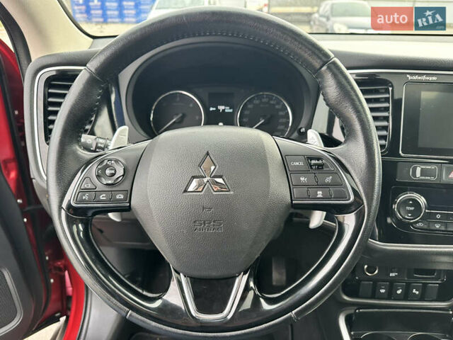 Красный Мицубиси Аутлендер, объемом двигателя 2.2 л и пробегом 118 тыс. км за 20999 $, фото 41 на Automoto.ua