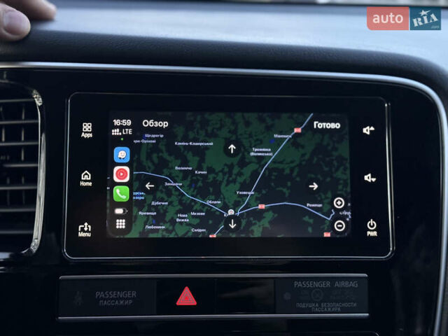 Красный Мицубиси Аутлендер, объемом двигателя 2 л и пробегом 85 тыс. км за 18900 $, фото 85 на Automoto.ua