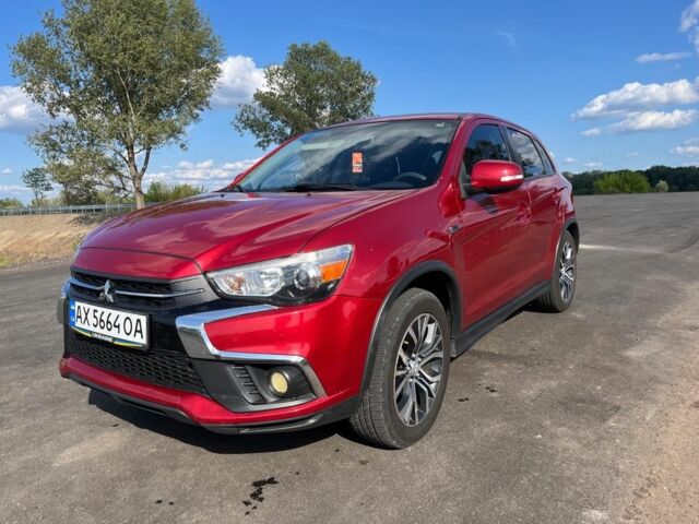 Красный Мицубиси Аутлендер, объемом двигателя 2 л и пробегом 130 тыс. км за 14300 $, фото 1 на Automoto.ua