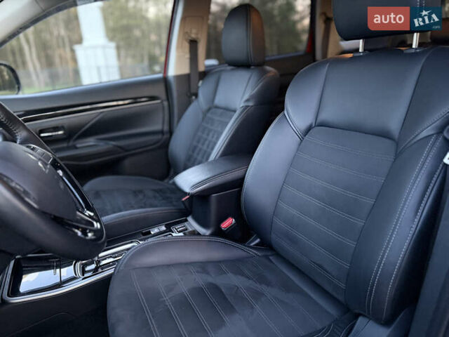 Красный Мицубиси Аутлендер, объемом двигателя 2 л и пробегом 85 тыс. км за 18900 $, фото 29 на Automoto.ua