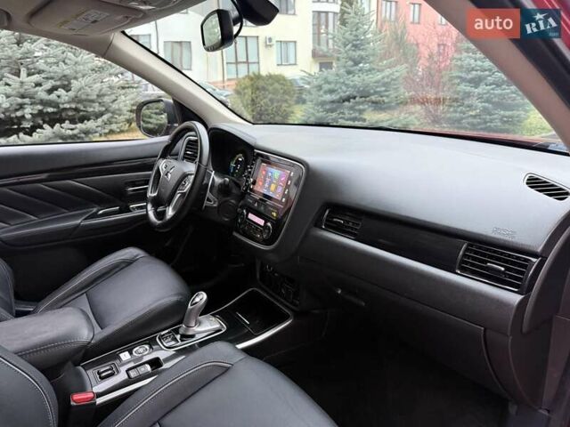 Красный Мицубиси Аутлендер, объемом двигателя 2 л и пробегом 176 тыс. км за 18900 $, фото 13 на Automoto.ua