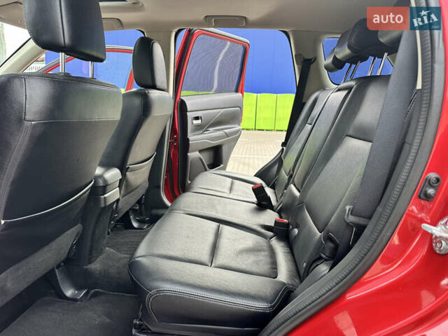 Красный Мицубиси Аутлендер, объемом двигателя 2.2 л и пробегом 118 тыс. км за 20999 $, фото 58 на Automoto.ua