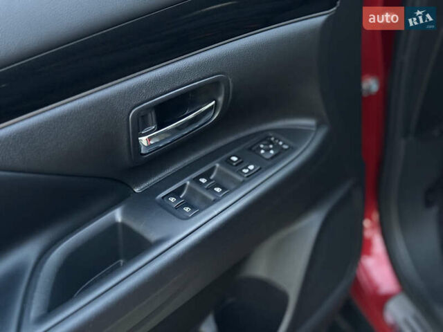 Красный Мицубиси Аутлендер, объемом двигателя 2 л и пробегом 85 тыс. км за 18900 $, фото 32 на Automoto.ua