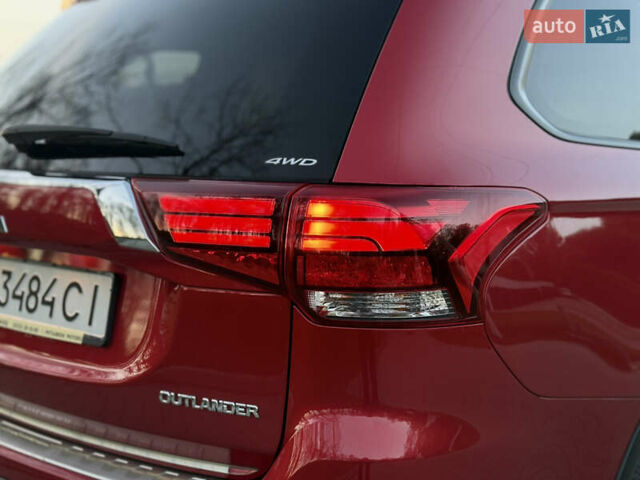 Красный Мицубиси Аутлендер, объемом двигателя 2 л и пробегом 85 тыс. км за 18900 $, фото 21 на Automoto.ua