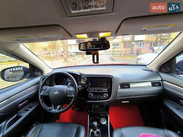 Красный Мицубиси Аутлендер, объемом двигателя 2.4 л и пробегом 125 тыс. км за 17400 $, фото 9 на Automoto.ua