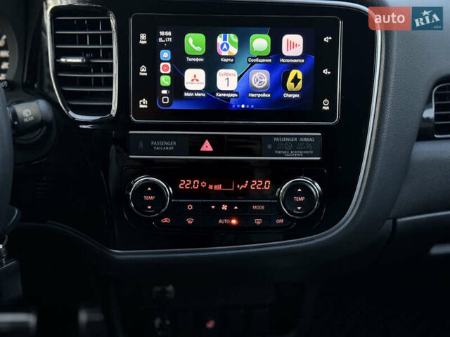 Красный Мицубиси Аутлендер, объемом двигателя 2 л и пробегом 85 тыс. км за 18900 $, фото 39 на Automoto.ua