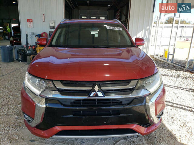 Красный Мицубиси Аутлендер, объемом двигателя 2 л и пробегом 226 тыс. км за 12500 $, фото 4 на Automoto.ua