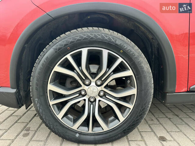 Красный Мицубиси Аутлендер, объемом двигателя 2.2 л и пробегом 118 тыс. км за 20999 $, фото 8 на Automoto.ua