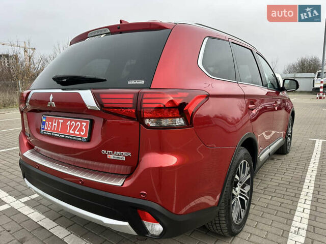 Красный Мицубиси Аутлендер, объемом двигателя 2.2 л и пробегом 118 тыс. км за 20999 $, фото 25 на Automoto.ua