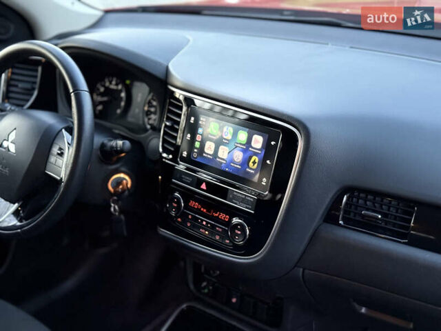 Красный Мицубиси Аутлендер, объемом двигателя 2 л и пробегом 85 тыс. км за 18900 $, фото 25 на Automoto.ua