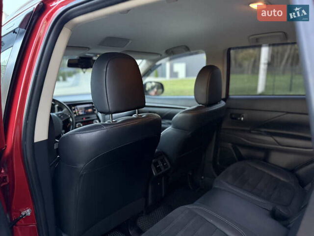 Красный Мицубиси Аутлендер, объемом двигателя 2 л и пробегом 85 тыс. км за 18900 $, фото 55 на Automoto.ua