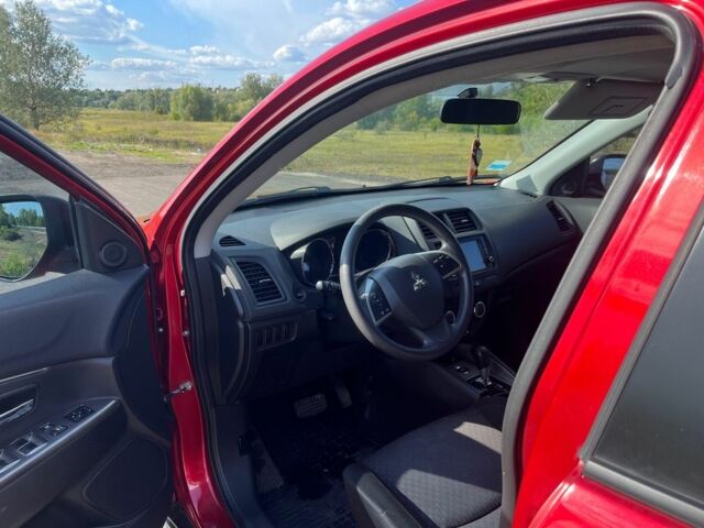 Красный Мицубиси Аутлендер, объемом двигателя 2 л и пробегом 130 тыс. км за 14300 $, фото 6 на Automoto.ua