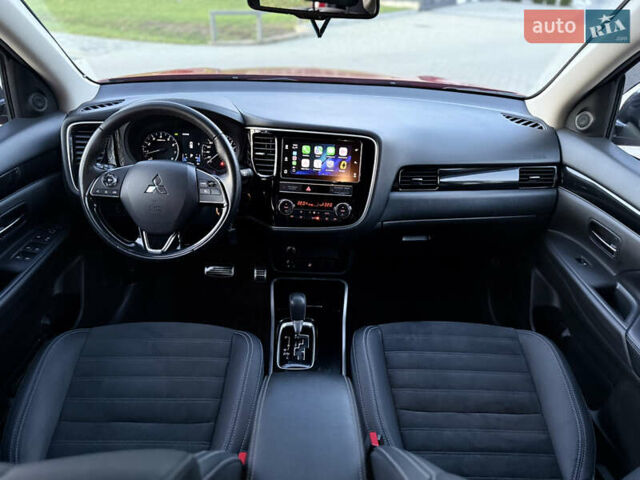 Красный Мицубиси Аутлендер, объемом двигателя 2 л и пробегом 85 тыс. км за 18900 $, фото 27 на Automoto.ua