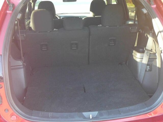 Красный Мицубиси Аутлендер, объемом двигателя 2.4 л и пробегом 117 тыс. км за 10500 $, фото 8 на Automoto.ua