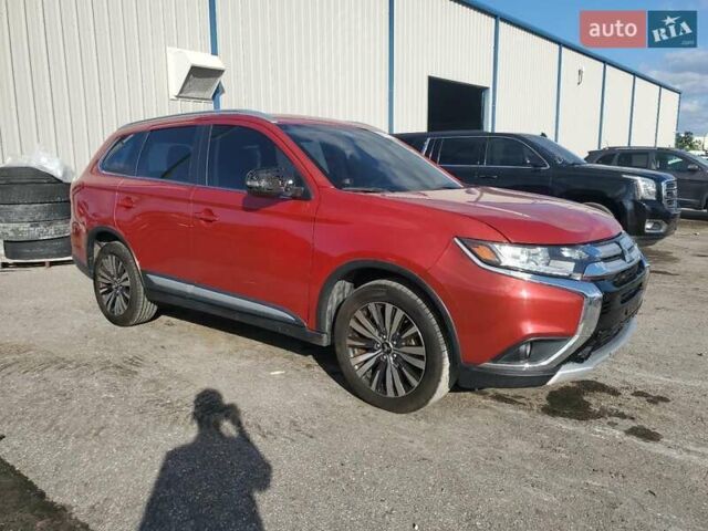 Червоний Міцубісі Аутлендер, об'ємом двигуна 2.4 л та пробігом 121 тис. км за 3500 $, фото 3 на Automoto.ua