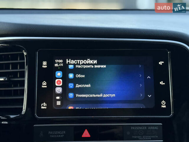 Красный Мицубиси Аутлендер, объемом двигателя 2 л и пробегом 85 тыс. км за 18900 $, фото 88 на Automoto.ua