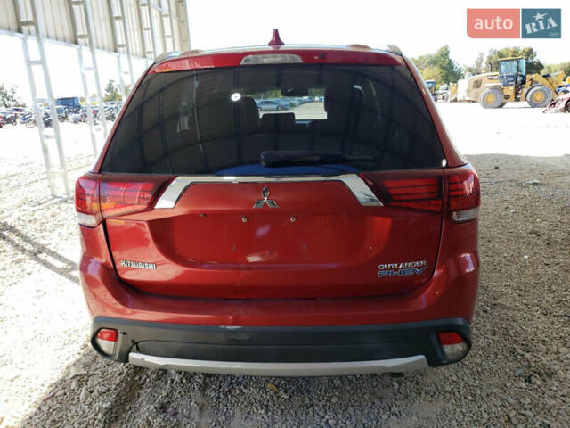 Красный Мицубиси Аутлендер, объемом двигателя 2 л и пробегом 226 тыс. км за 12500 $, фото 5 на Automoto.ua