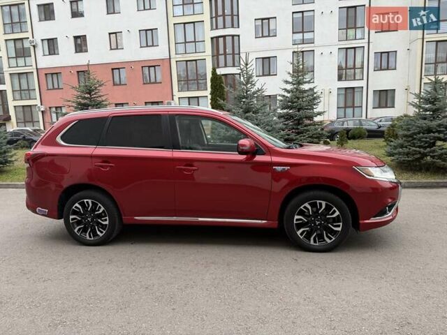 Красный Мицубиси Аутлендер, объемом двигателя 2 л и пробегом 176 тыс. км за 18900 $, фото 3 на Automoto.ua