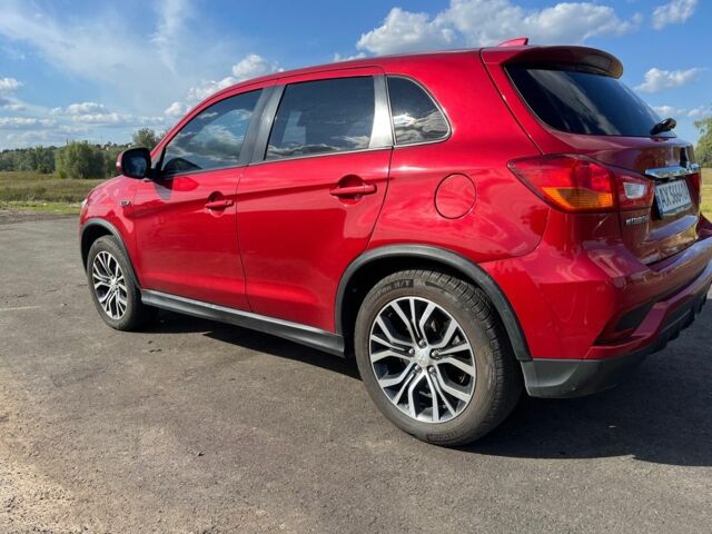 Красный Мицубиси Аутлендер, объемом двигателя 2 л и пробегом 130 тыс. км за 14300 $, фото 2 на Automoto.ua