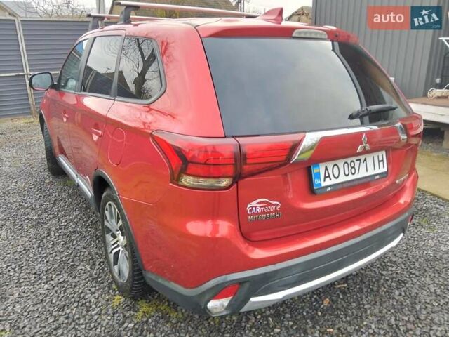 Красный Мицубиси Аутлендер, объемом двигателя 2.36 л и пробегом 110 тыс. км за 16800 $, фото 8 на Automoto.ua
