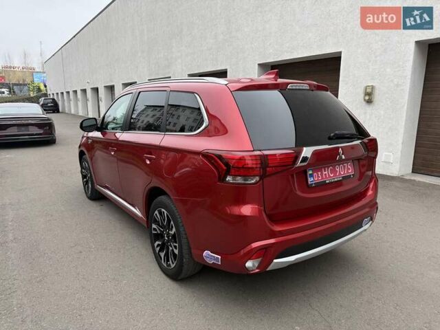 Красный Мицубиси Аутлендер, объемом двигателя 2 л и пробегом 176 тыс. км за 18900 $, фото 6 на Automoto.ua