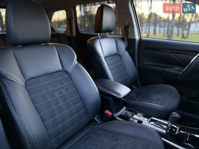 Красный Мицубиси Аутлендер, объемом двигателя 2 л и пробегом 85 тыс. км за 18900 $, фото 37 на Automoto.ua