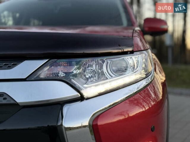 Красный Мицубиси Аутлендер, объемом двигателя 2 л и пробегом 85 тыс. км за 18900 $, фото 17 на Automoto.ua